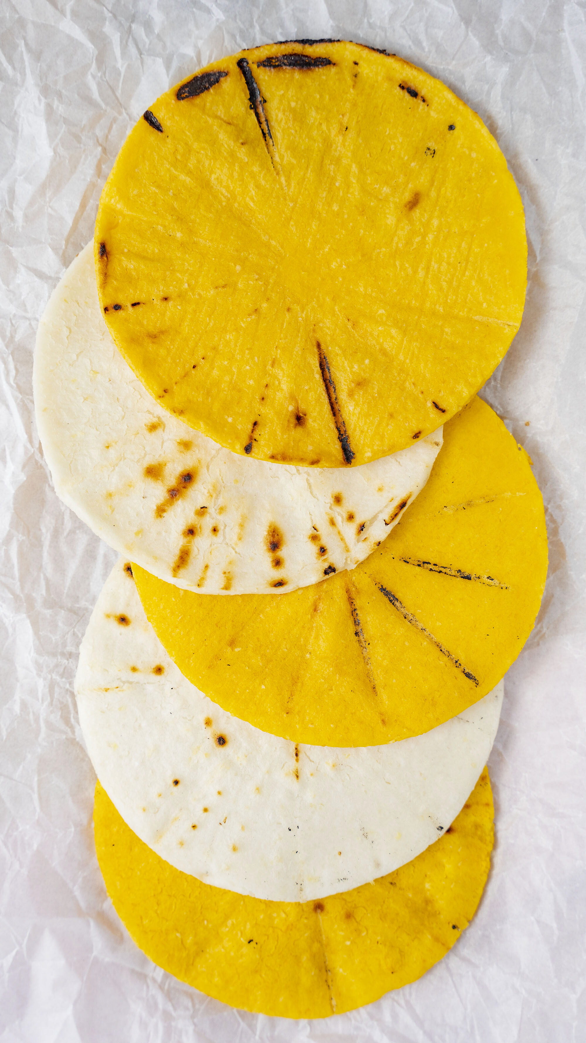 Yellow corn and white arepas, Colombian style