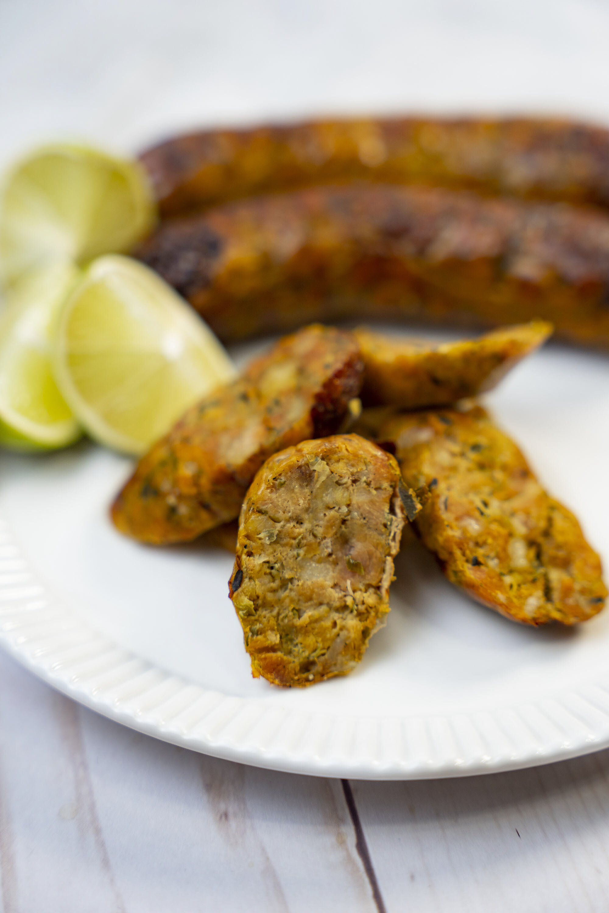 Sliced Colombian chorizo showing seasoned interior